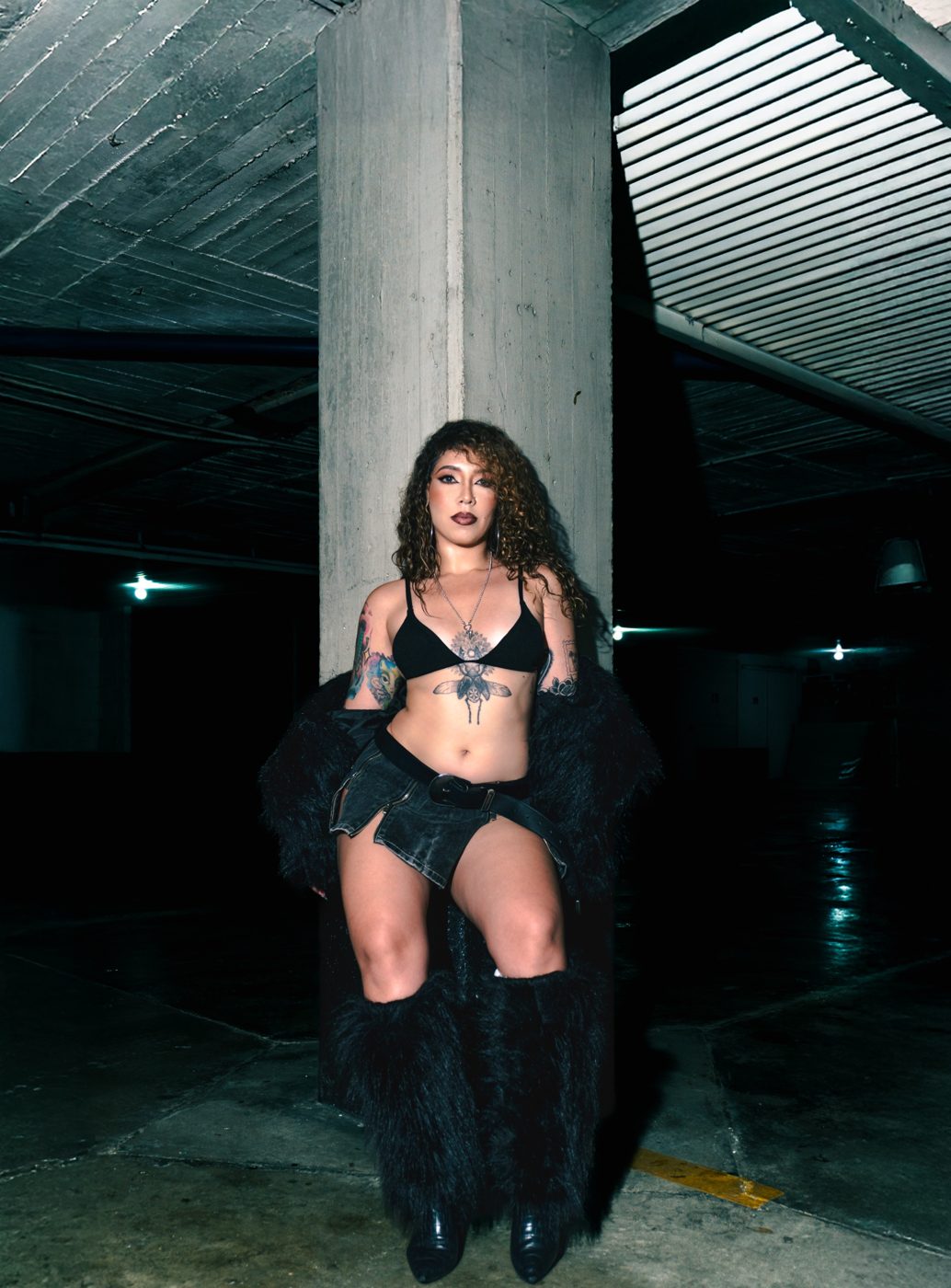 Estefanía Navas in an urban concrete parking lot